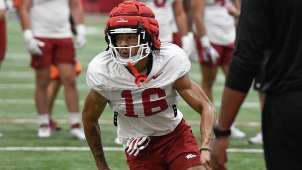 Razorbacks wide receiver Isaiah Sategna runs a route during Tuesday morning's practice